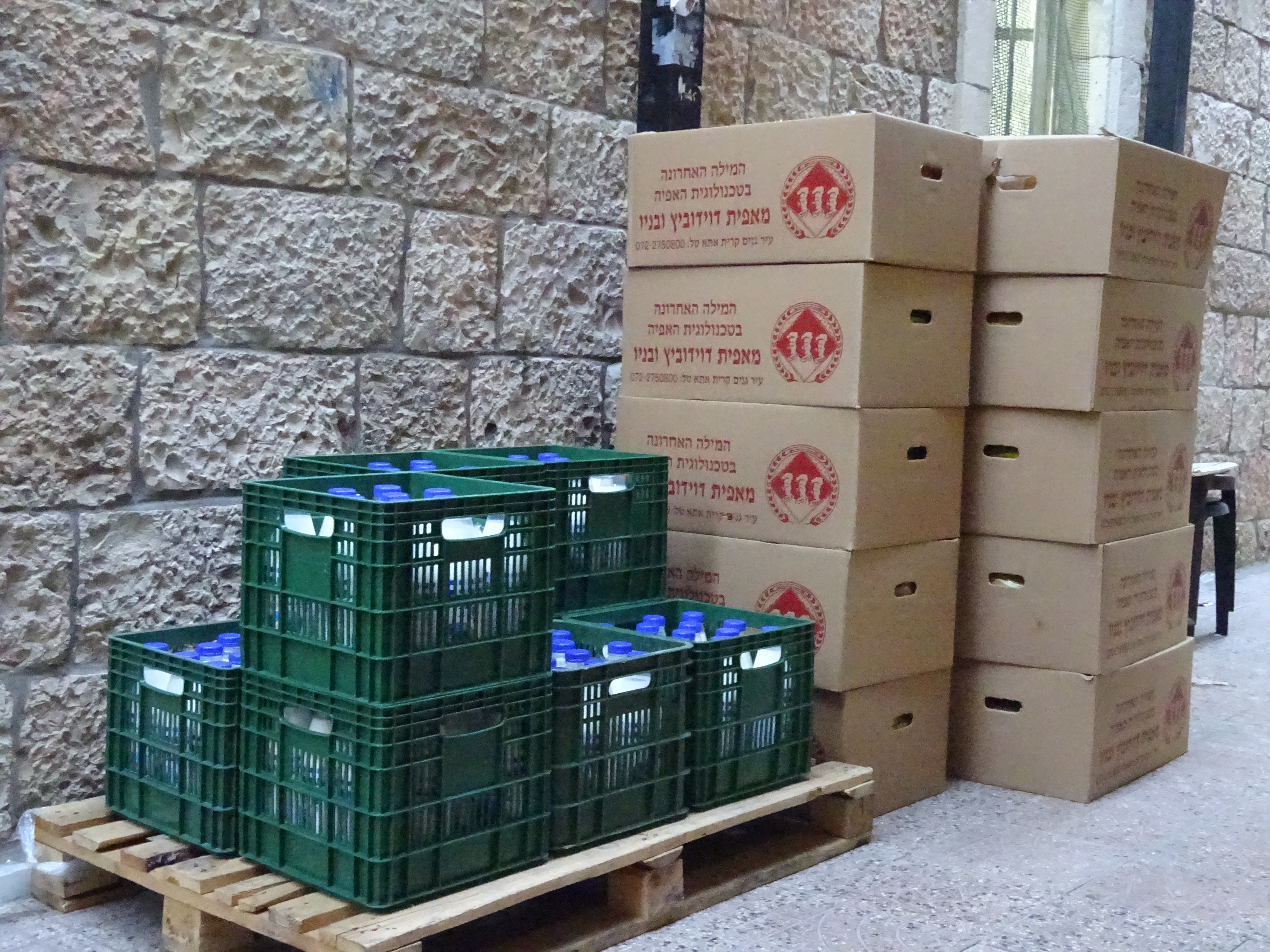 Crates of milk and boxes of bread